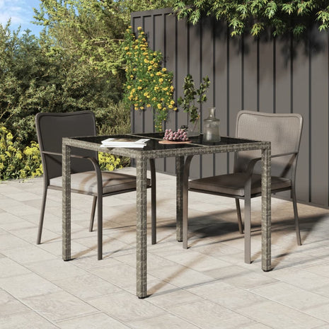 Tuintafel 90x90x75 cm gehard glas en poly rattan grijs