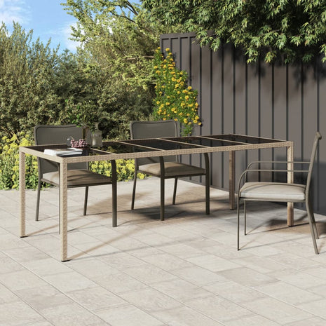 Tuintafel 250x100x75 cm gehard glas en poly rattan beige