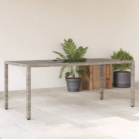 Tuintafel met glazen blad 190x90x75 cm poly rattan grijs